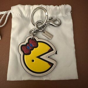 Coach Yellow Pac-Man Keychain with Red Bow Limited Edition